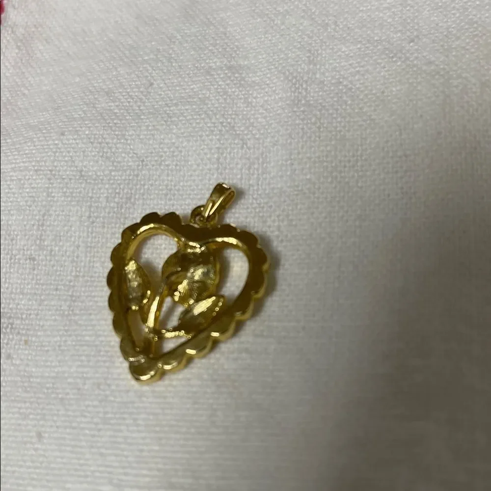 Gold Tone Heart Pendant with Red Gemstone
